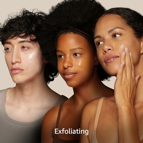 Three people with exfoliating skincare products on their faces.